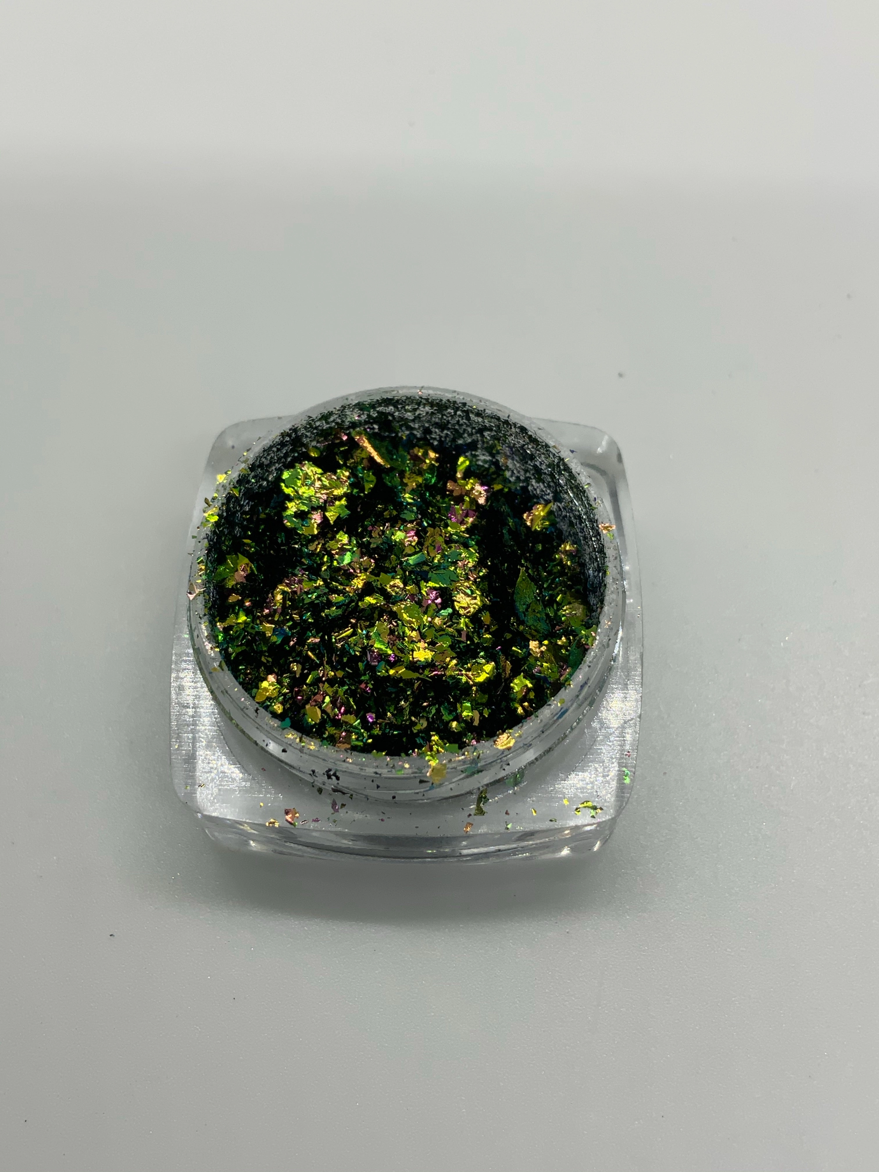 Green lantern flakes and pigments